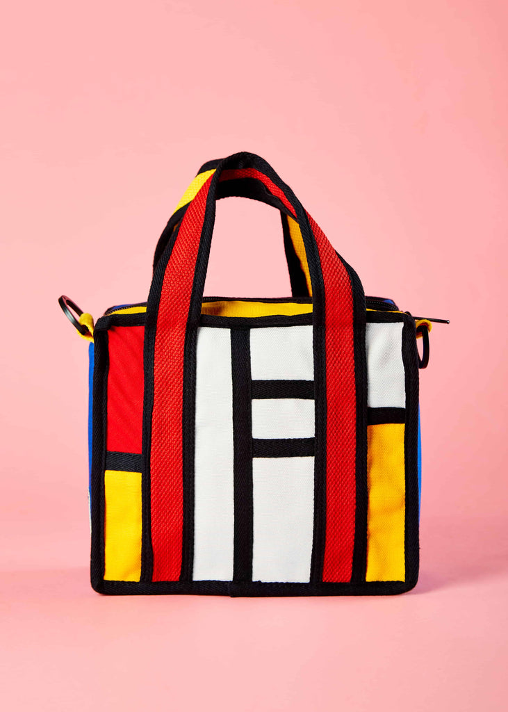 Piet Mondrian Colorblock Design" Alt text: "Front view of the Floris sling bag, showcasing a vibrant colorblock pattern inspired by Piet Mondrian's art. The bag features geometric shapes in bold primary colors, adding a touch of modern art to your style."  Picture 2: "Versatile Floris Canvas