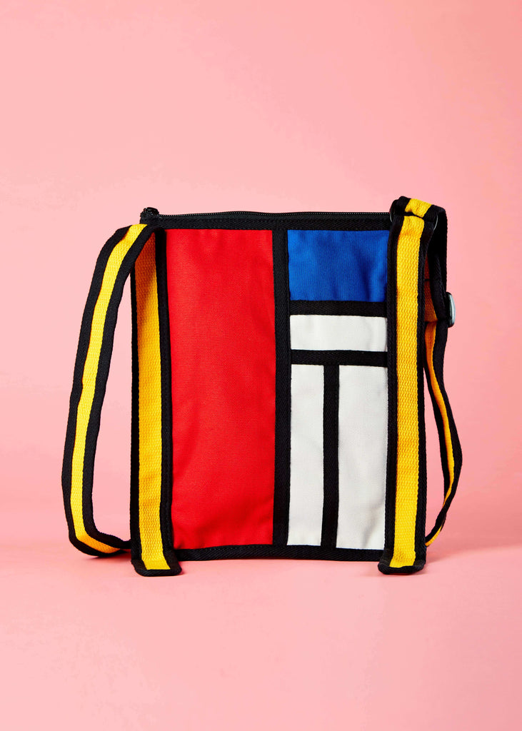 Rei Urban Jhola - Piet Mondrian Colorblock Art"    Front view of the Rei urban jhola, featuring a captivating Piet Mondrian-inspired colorblock art design. This jhola bag is crafted from durable canvas, adding a modern artistic flair to your urban style.
