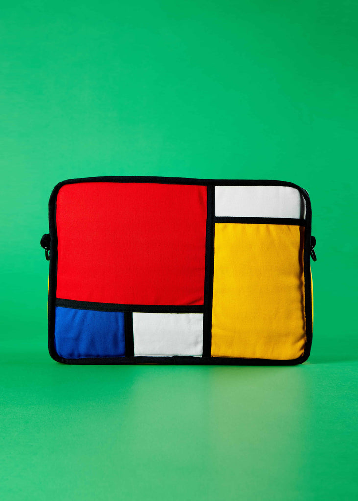 Noa Laptop Sleeve - Piet Mondrian Colorblock Design.   Front view of the Noa laptop sleeve featuring a captivating Piet Mondrian-inspired colorblock design. This stylish sleeve is crafted from durable canvas, perfect for both iPads and laptops, adding an artistic touch to your tech accessories.