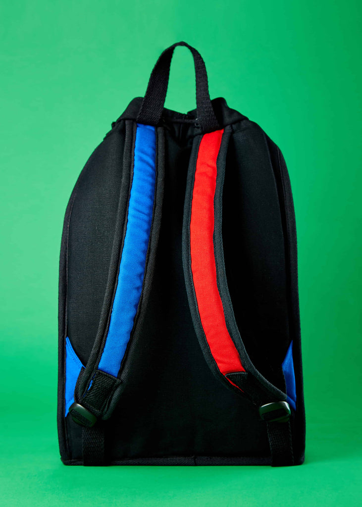 Soelaas Travel Drawstring Backpack - Embodying Art and Functionality"     A lifestyle shot featuring the Soelaas travel drawstring backpack, a harmonious blend of art and functionality. The Piet Mondrian colorblock artistry adds an artistic touch to this reliable travel companion.