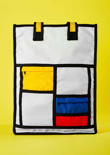 Kilte Long Spacious Tote Bag - Piet Mondrian Colorblock Design.   Front view of the Kilte long spacious tote bag, showcasing a captivating colorblock pattern inspired by Piet Mondrian's art. The bag features bold primary colors and geometric shapes, offering both style and functionality.